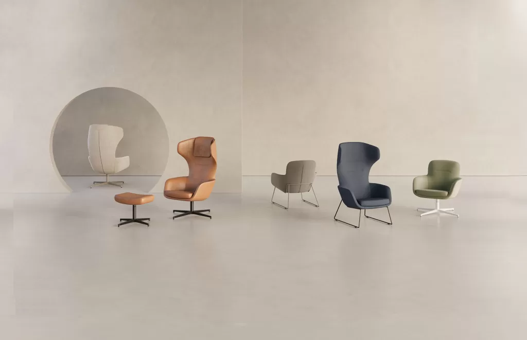 Poltrona Zenith com linhas fluídas e base elegante.